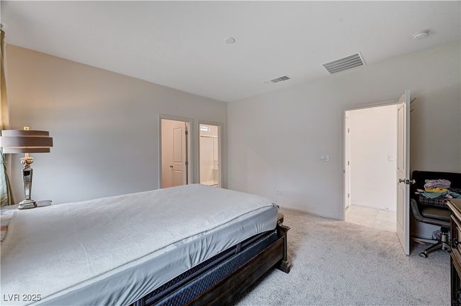 Bedroom featuring light carpet and baseboards | Image 21
