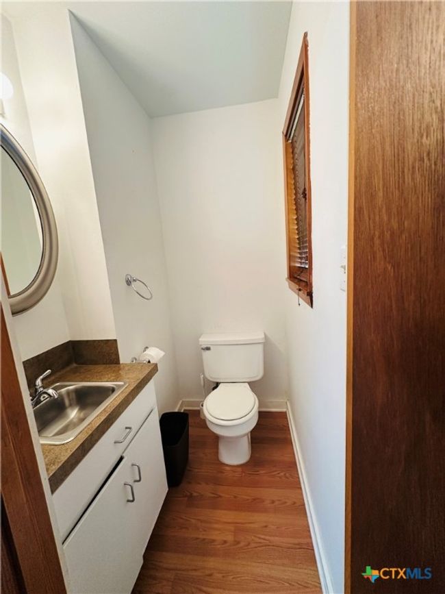 1/2 bath in front office | Image 12