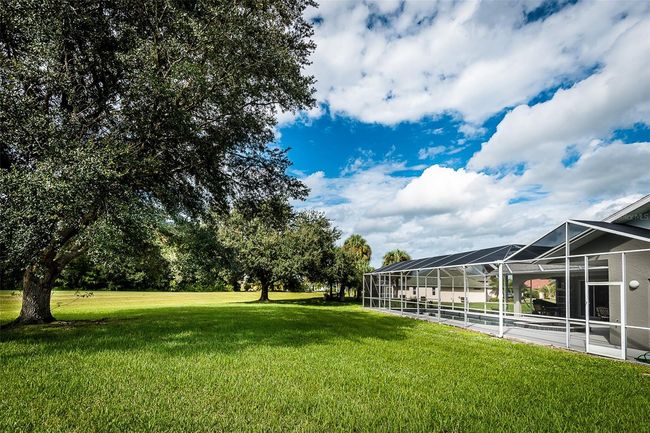 27406 Tierra Del Fuego Cir, House other with 4 bedrooms, 4 bathrooms and null parking in PUNTA GORDA FL | Image 75