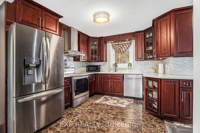 8411 Russell Rd, House other with 7 bedrooms, 5 bathrooms and 30 parking in Navan ON | Image 7