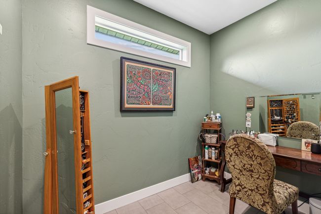 Office area with light tile patterned flooring and baseboards | Image 25