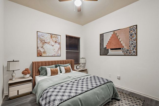 Two additional bedrooms with large closets share a perfectly placed second full bath in the hallway. | Image 31