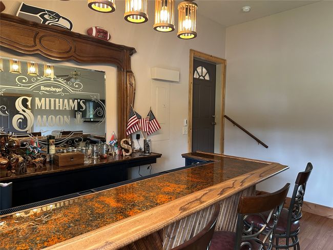 Family room has it all~ Wood Stove Heat: Custom Bar a perfect place to spend the day! | Image 31