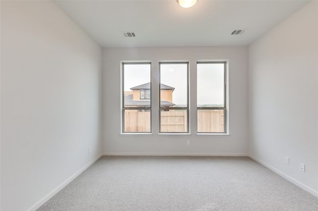 Carpeted empty room with baseboards | Image 16