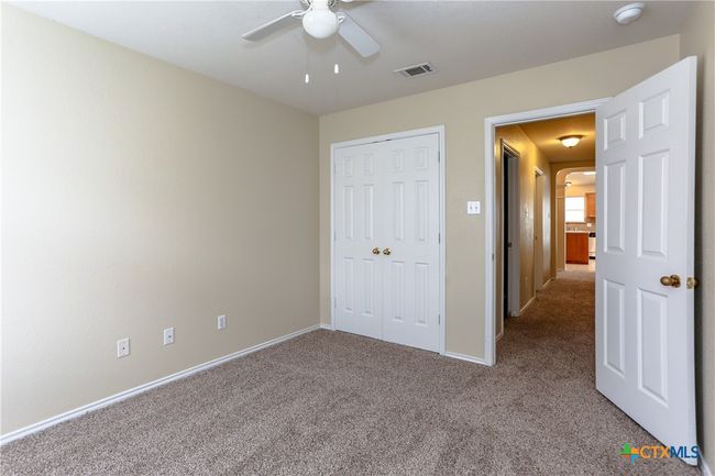 Second bedroom closet looking out into the hallway | Image 27