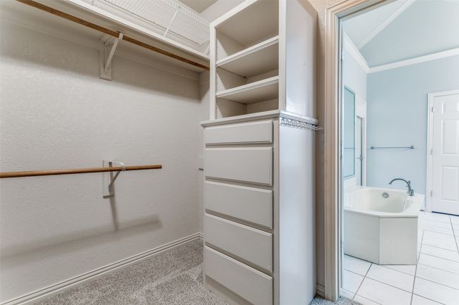 Primary Spacious Closet with built in cabinetry | Image 17