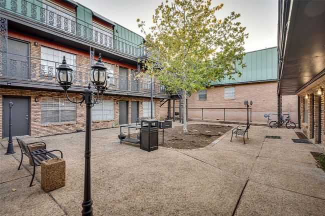 View of home's community featuring a patio and fence | Image 25