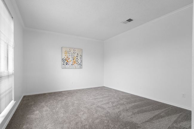 The formal living room to the left of the entry could be used as an office. | Image 6