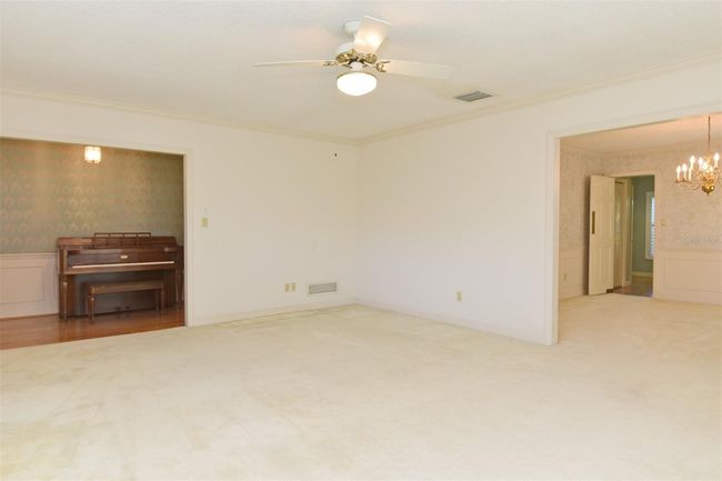 Living Room Pic 3 with Foyer view on left and Dining room on right | Image 22