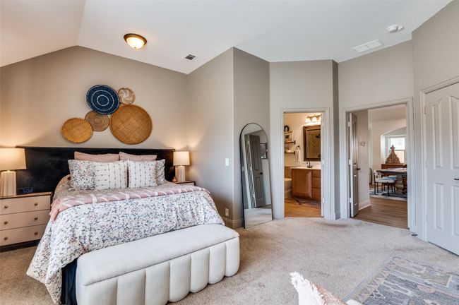 Expansive primary bedroom with ensuite bath and walk in closet! See next picture for more of the primary! | Image 9
