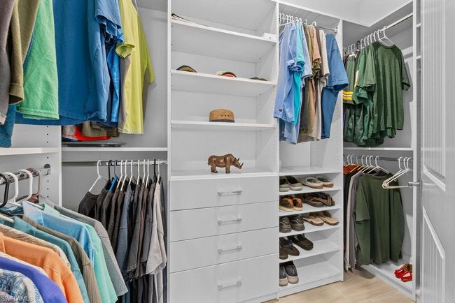 View of spacious closet | Image 21