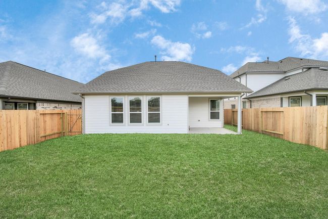 Come and see this spacious backyard with its beautiful covered patio. There is plenty of room for the kids to play and adults to relax. Perfect for your outdoor living space, patio furniture, bbq pit, and so much more. The possibilities are endless! | Image 38