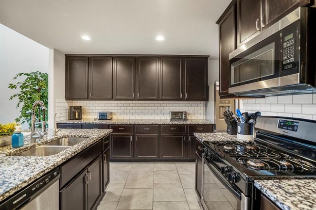 The subway tile on the backsplash makes it an easy option to keep clean and fresh. | Image 12