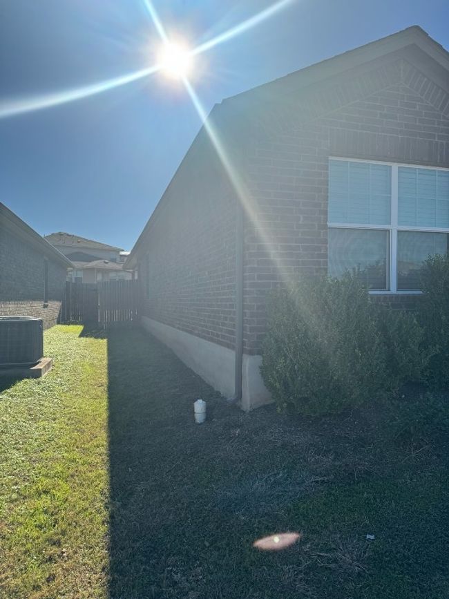 LEFT CORNER VIEW OF HOUSE/YARD | Image 21
