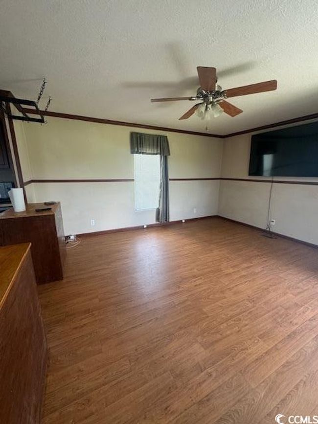 Interior space featuring ceiling fan | Image 4