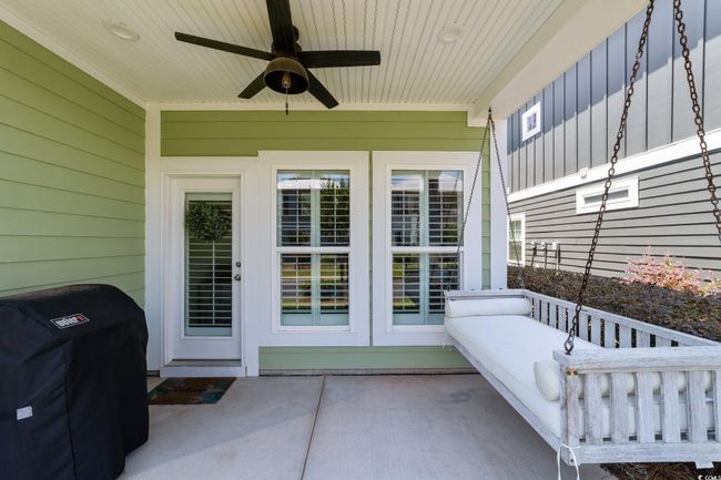 View of patio / terrace with french doors, a ceiling fan, and a grill | Image 28