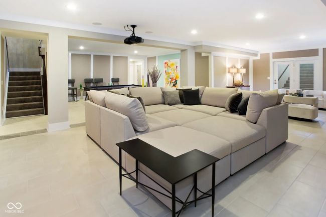 Spacious lower level game room perfect for entertainment and fun. | Image 9