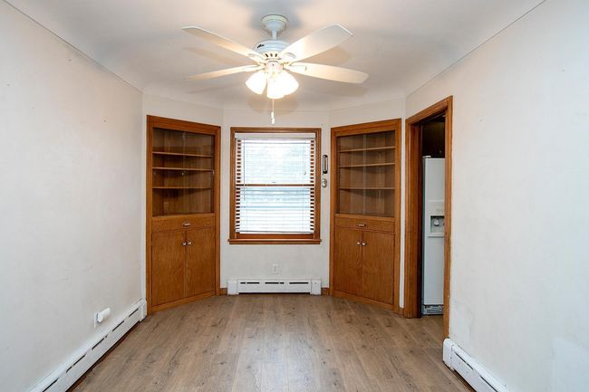 Dining room with adorable built-in cabinets | Image 6