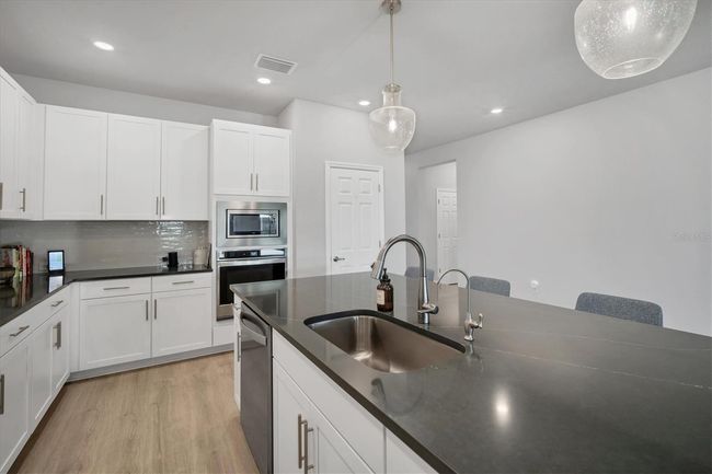 11021 Moonsail Dr, House other with 4 bedrooms, 3 bathrooms and null parking in Parrish FL | Image 13