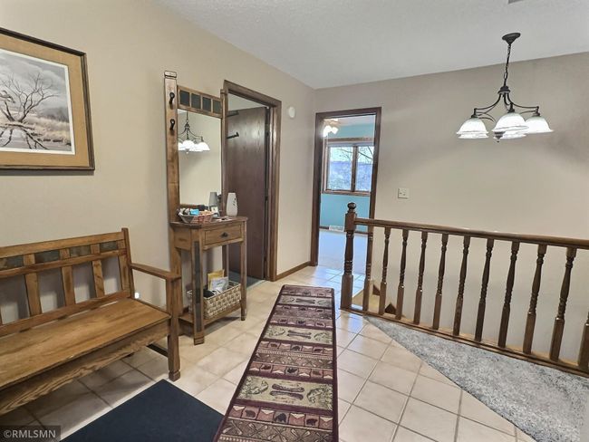 A spacious entryway welcomes friends and family to the lake! | Image 19