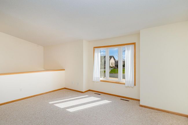 Knee wall by staircase for ease of furniture placement. | Image 6