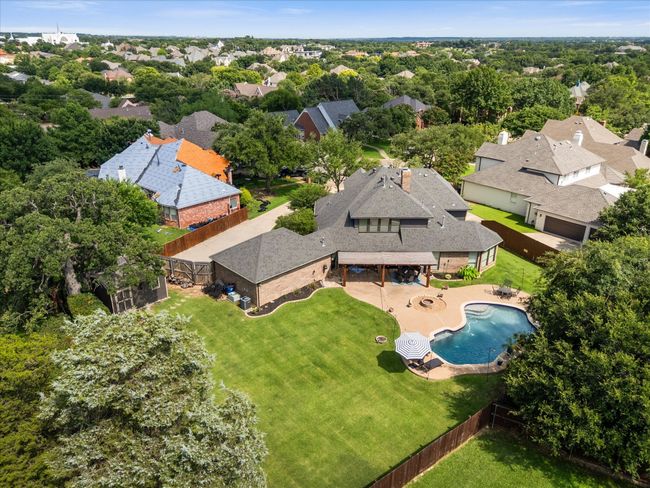 Aerial perspective of suburban area featuring a pool area | Image 34