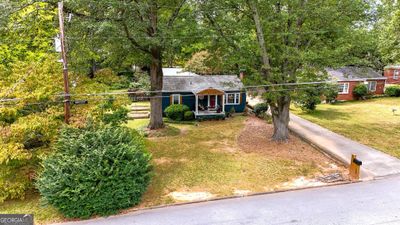 Nice mature yard with hardwood trees. | Image 2