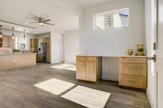This condo does not have a wall between the living room and the office area. This is an option. This condo is #931 and is floor plan A. | Image 30