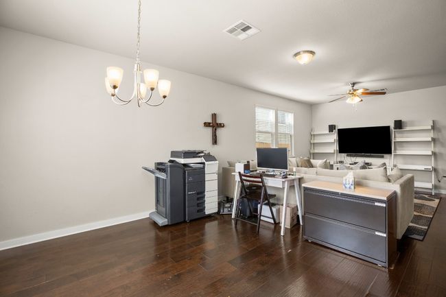 The combined living/dining area provides ample room for both relaxation and hosting guests. | Image 8