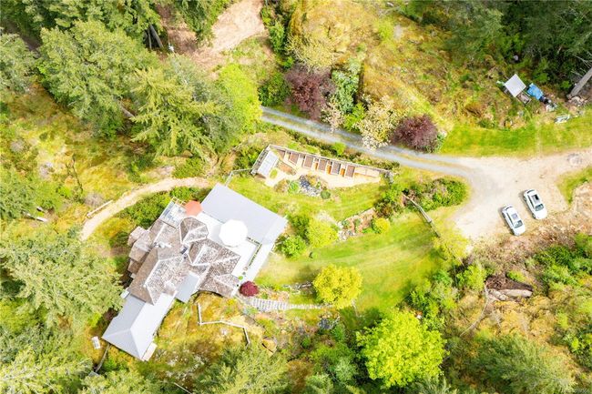 Primary residence view of home, yard and parking | Image 86