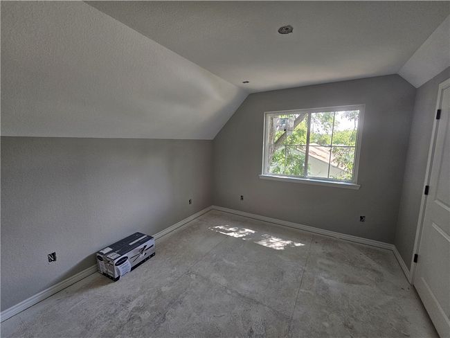 Additional living space with lofted ceiling and baseboards | Image 7