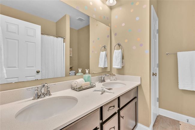 Dual sinks in the guest bathroom. | Image 30