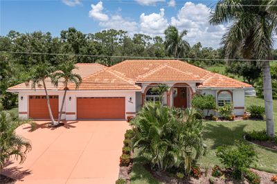 24434 Rio Togas Road, House other with 3 bedrooms, 2 bathrooms and null parking in Punta Gorda FL | Image 1