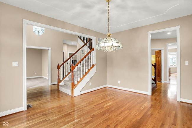 Dining Rm kitchen access thru door on right note main level bath door and entry into kitchen | Image 6