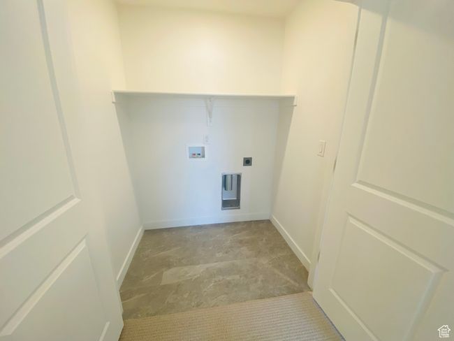 Laundry area with hookup for a washing machine and electric dryer hookup | Image 21