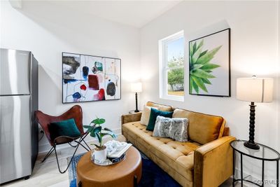 Living area featuring light hardwood / wood-style flooring | Image 3