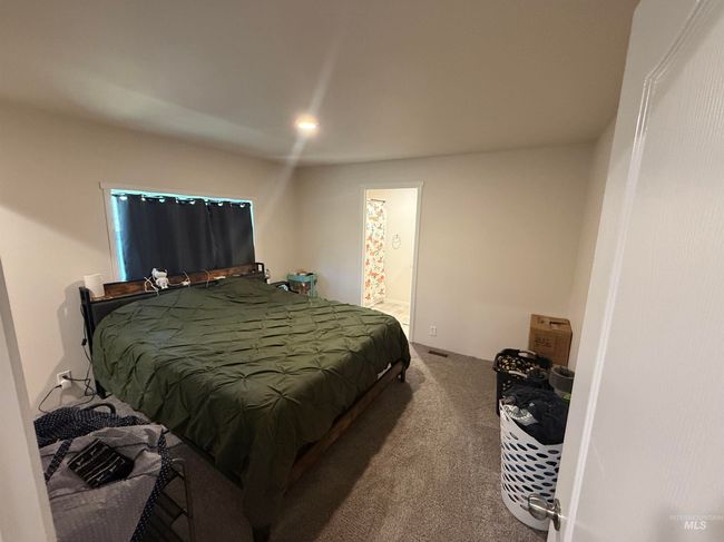 Bedroom with carpet floors | Image 7
