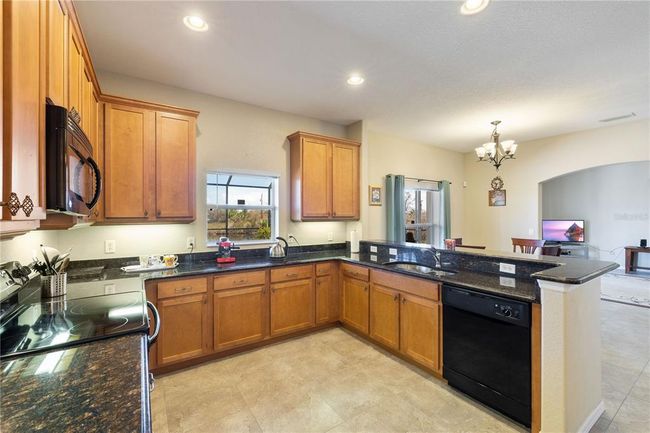 14462 Fort Worth Cir, House other with 4 bedrooms, 3 bathrooms and null parking in PORT CHARLOTTE FL | Image 4
