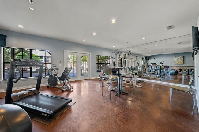 Workout area featuring recessed lighting and french doors | Image 20