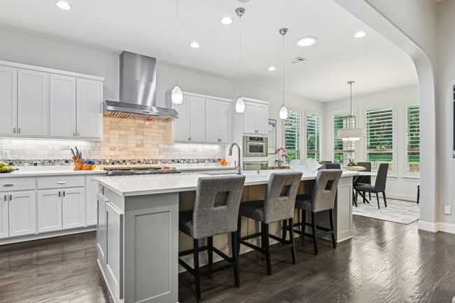 Gorgeous kitchen with large island | Image 10