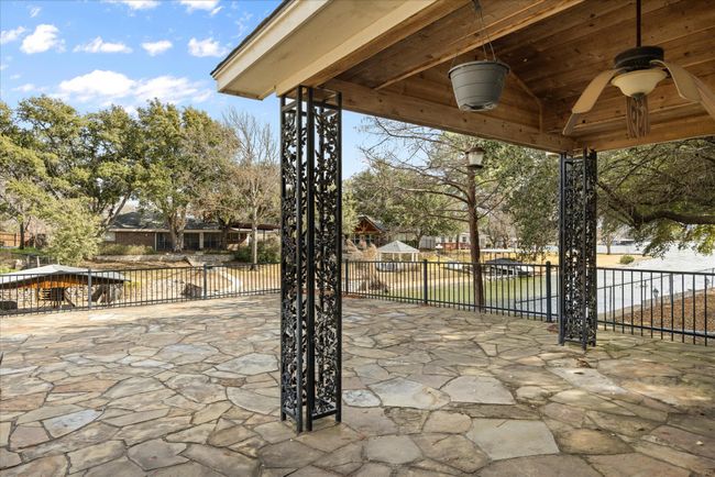 Huge rock patio over double boat dock | Image 29