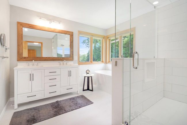 Primary bathroom tub & double shower | Image 18