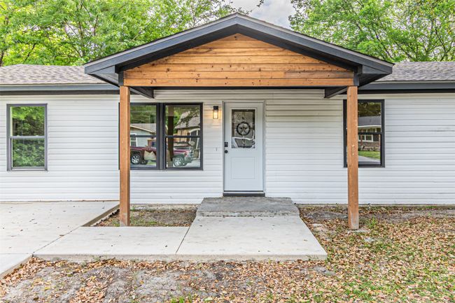 View of front of property featuring a shingled roof | Image 4