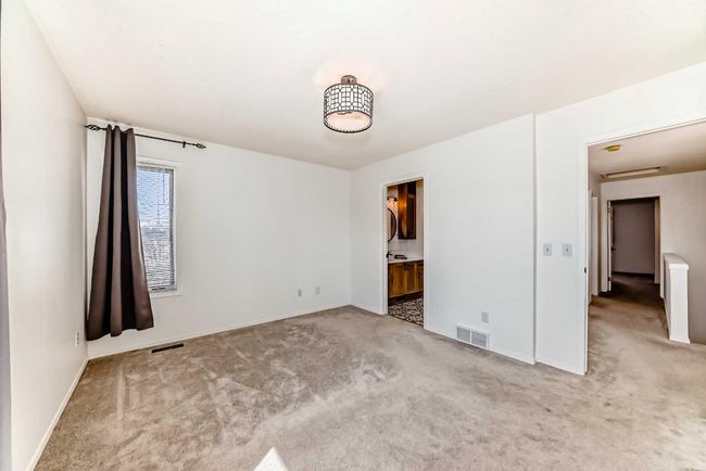 207 Coachway Rd Sw, House other with 3 bedrooms, 3 bathrooms and 2 parking in Calgary AB | Image 24