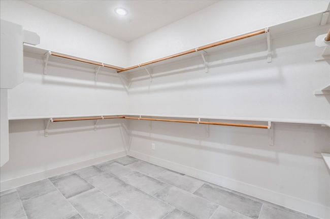 View of walk in closet | Image 20