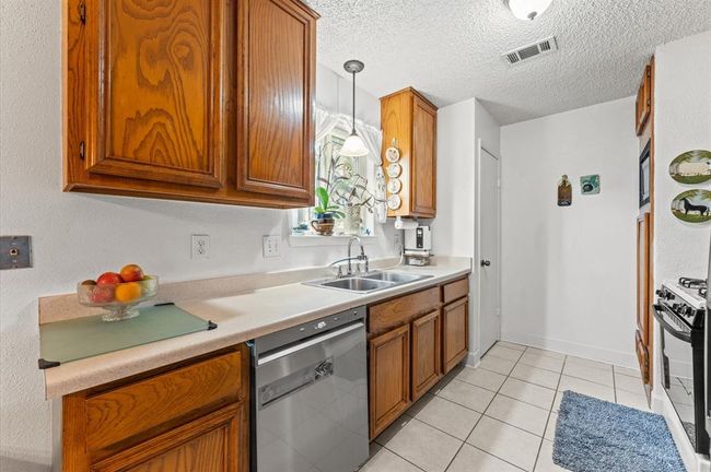 Light and Bright kitchen with a window above your sink! | Image 16