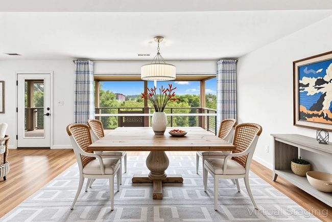 Virtually staged Dining area has sweeping views | Image 6