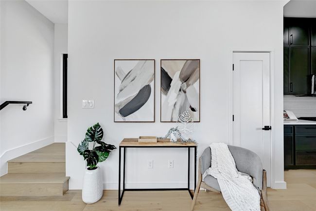 Sitting room featuring light wood-type flooring | Image 4