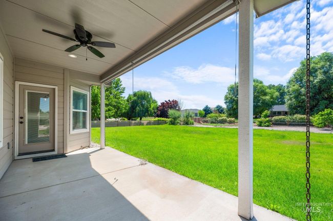 View of patio with a ceiling fan | Image 35