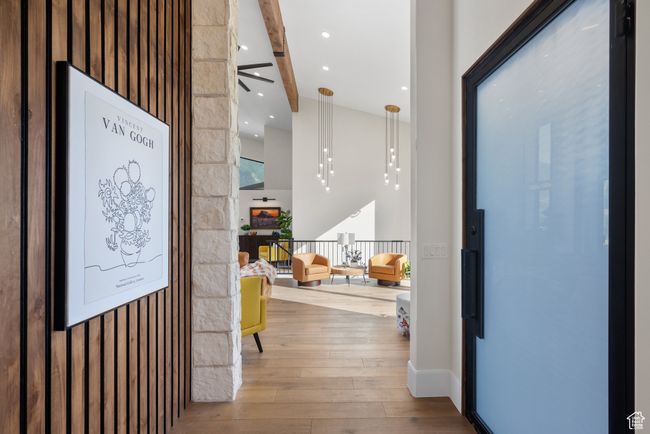 Entrance foyer with hardwood / wood-style floors, a ceiling fan, and beamed ceiling | Image 15